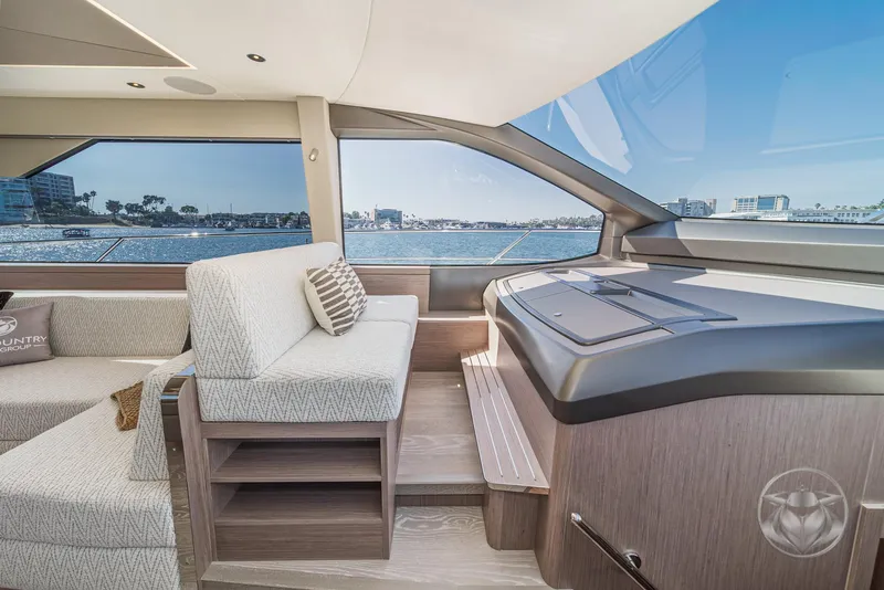 Slide: The Image of Luxurious interior of 2025 Sunseeker Manhattan 68 yacht with panoramic ocean view. - 49