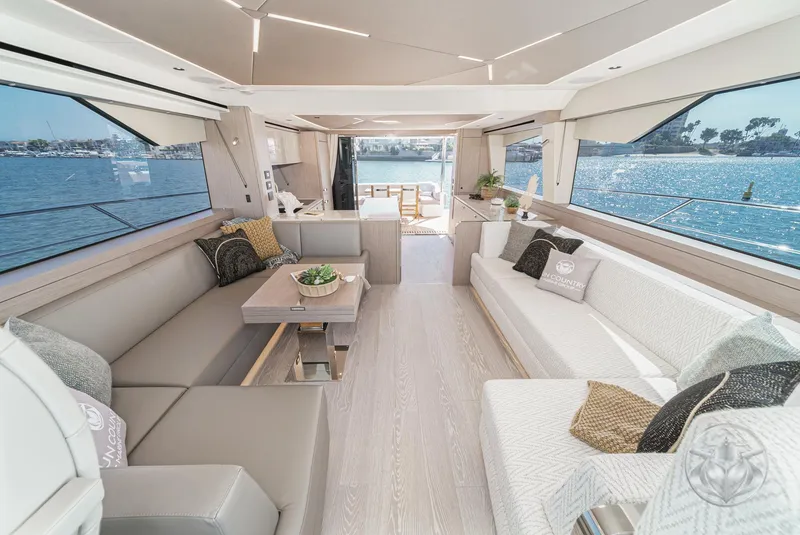 Slide: The Image of Luxurious interior of 2025 Sunseeker Manhattan 68 yacht with elegant seating and ocean view. - 5