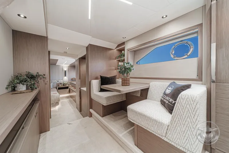 Slide: The Image of Luxurious interior of 2025 Sunseeker Manhattan 68 yacht with elegant seating and decor. - 6