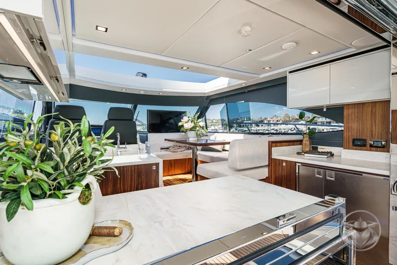 Slide: The Image of Luxurious interior of 2026 Riviera 4600 Sport Yacht Platinum Edition with modern design and elegant finishes. - 30
