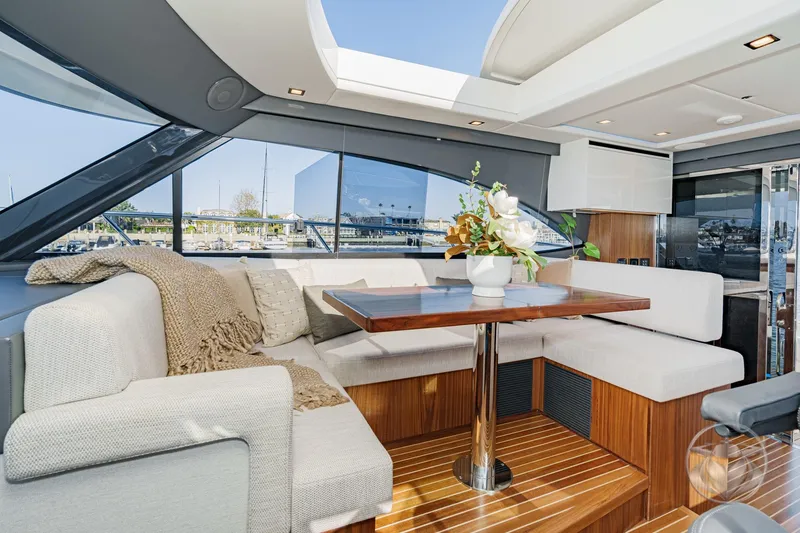 Slide: The Image of Luxurious interior of 2026 Riviera 4600 Sport Yacht Platinum Edition with elegant seating and decor. - 37