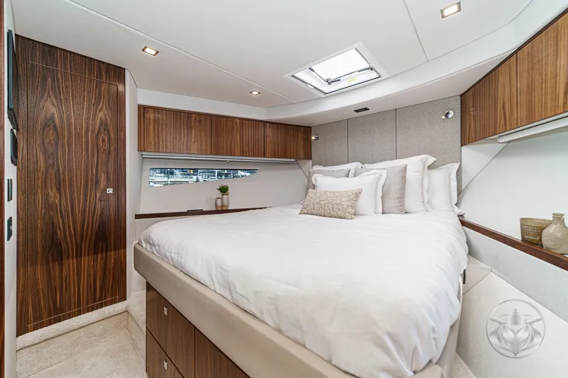 Slide: The Image of Luxurious bedroom interior of 2026 Riviera 4600 Sport Yacht Platinum Edition. - 50