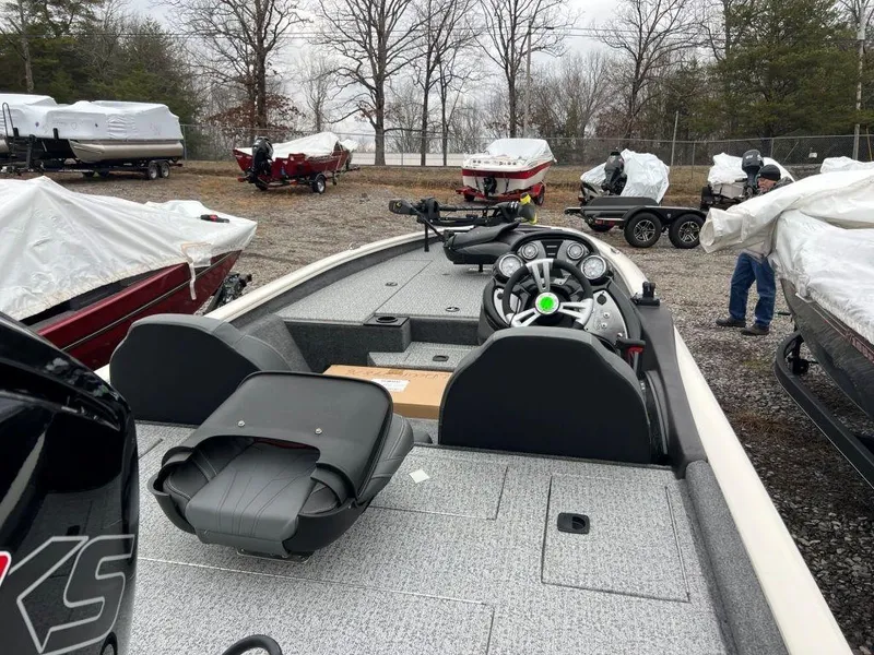 Slide: The Image of 2023 Tracker Pro Team™ 190 TX fishing boat in a storage yard. - 3