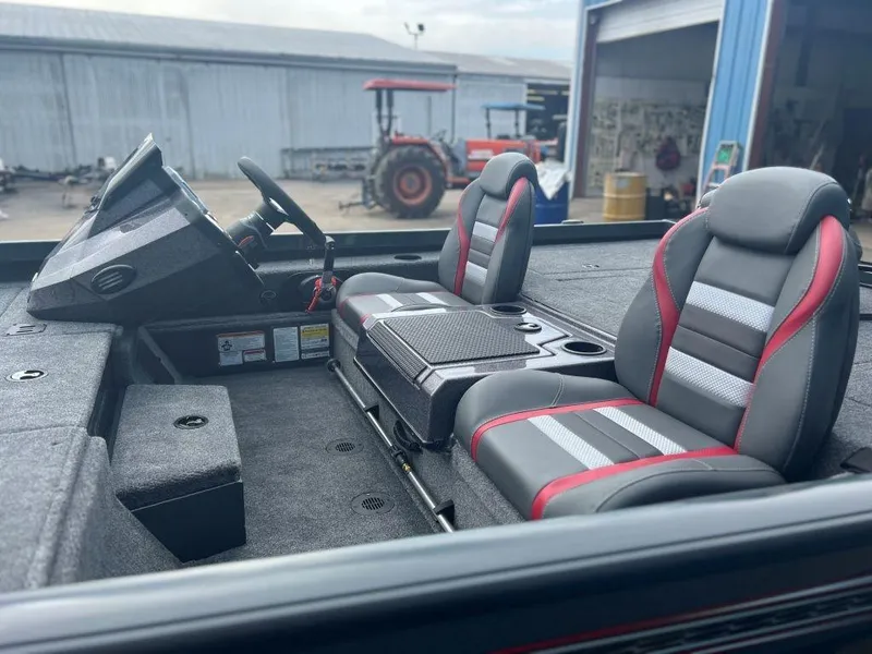 Slide: The Image of 2023 Ranger RT188P boat interior with dual seats and steering wheel. - 7