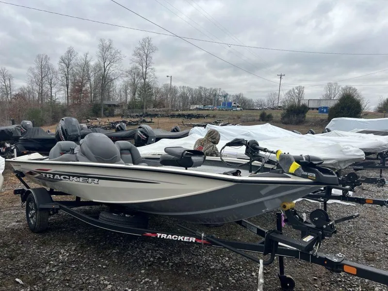 The Image of 2023 Tracker Pro Team 175 TXW® fishing boat on trailer in outdoor lot. - 1