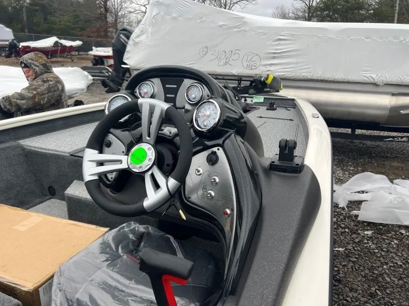 Slide: The Image of 2023 Tracker Pro Team 175 TXW® boat dashboard and steering wheel. - 5