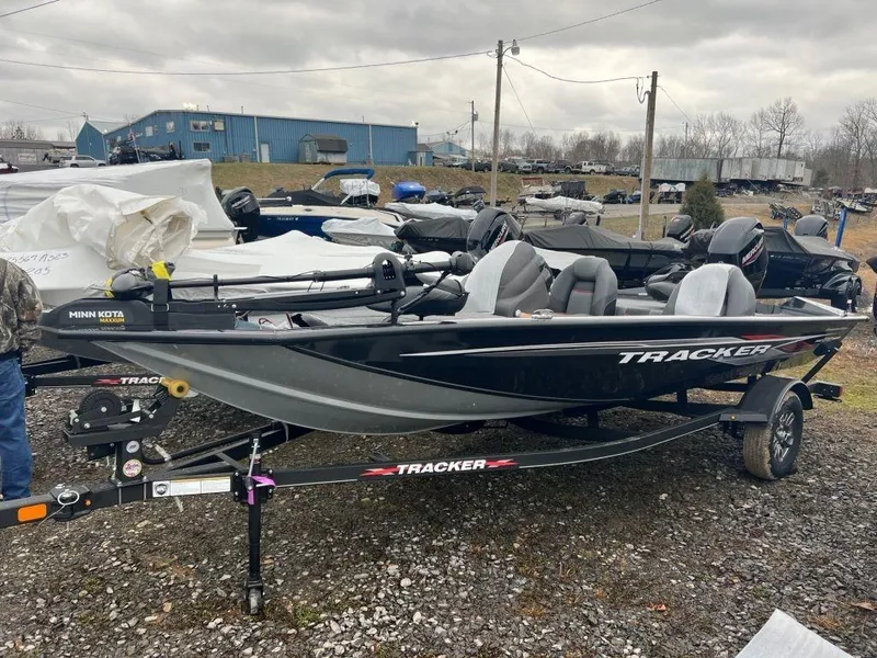 The Image of 2023 Tracker Pro Team 175 TF® fishing boat on trailer in outdoor lot. - 0
