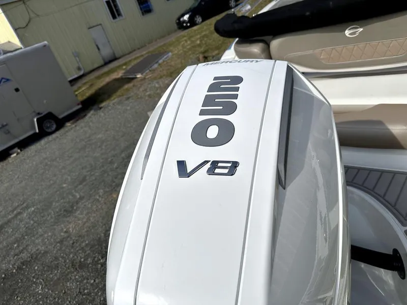 Slide: The Image of 2024 Crownline XSS Series 250 boat with Mercury 250 V8 engine. - 10