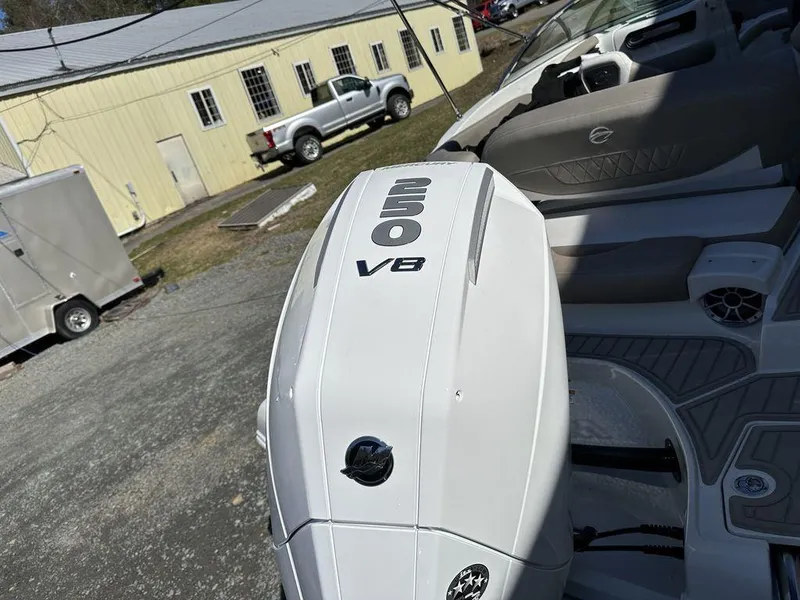 Slide: The Image of 2024 Crownline XSS Series 250 boat with a powerful V8 engine. - 6