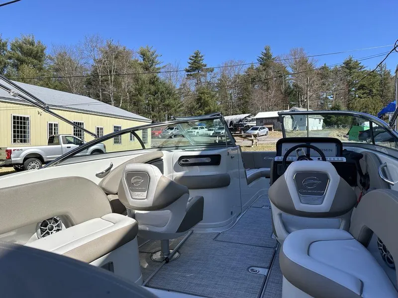 Slide: The Image of 2024 Crownline XSS Series 250 boat interior with seating and dashboard. - 7