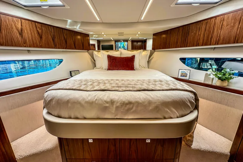Slide: The Image of Luxurious 2026 Riviera 505 SUV yacht interior with elegant seating and scenic water view. - 20