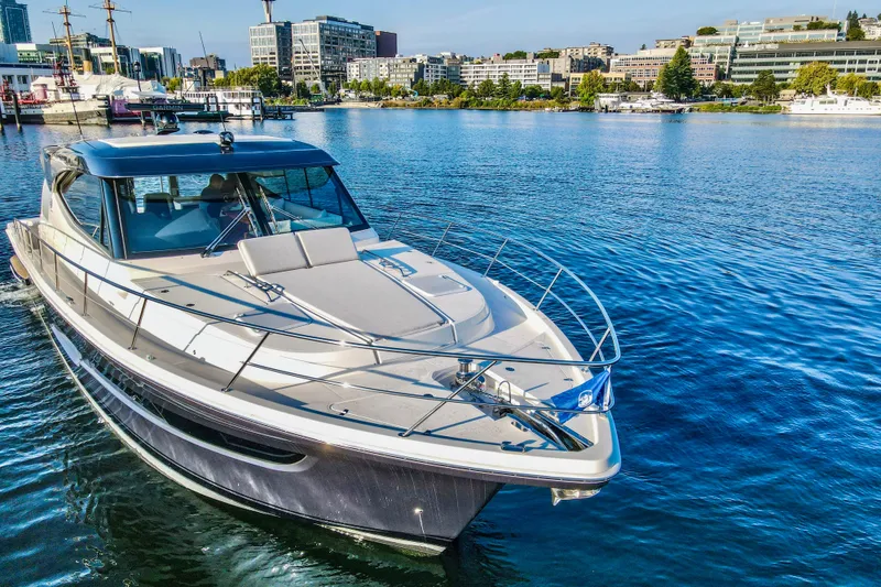 Slide: The Image of 2026 Riviera 505 SUV luxury yacht cruising on calm blue waters. - 3