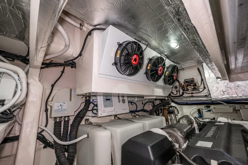 Slide: The Image of Engine room of 2026 Riviera 505 SUV with advanced cooling system and wiring. - 57