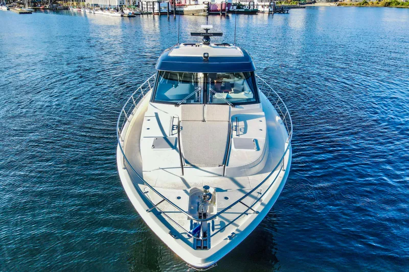 Slide: The Image of 2026 Riviera 505 SUV yacht on serene water with scenic background. - 6