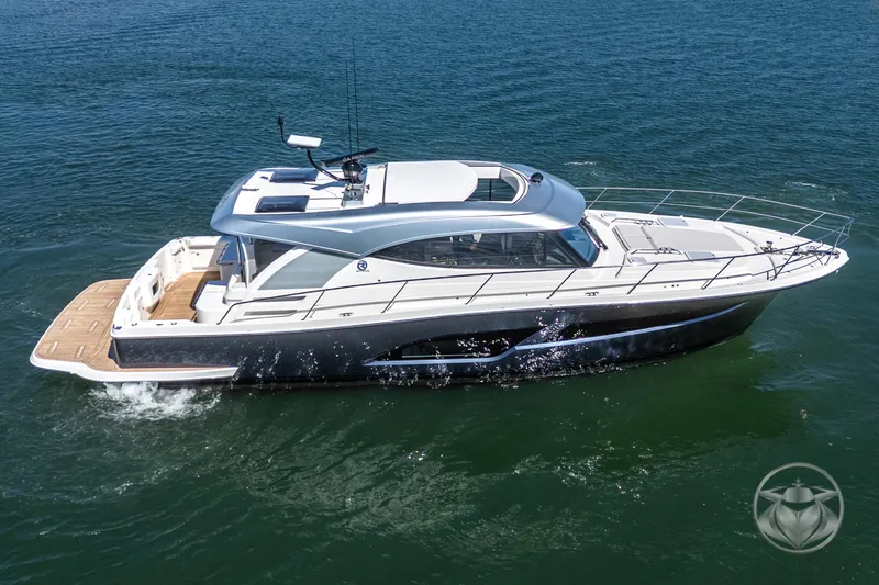 Slide: The Image of 2025 Riviera 465 SUV cruising on open water, showcasing sleek design and luxury features. - 12