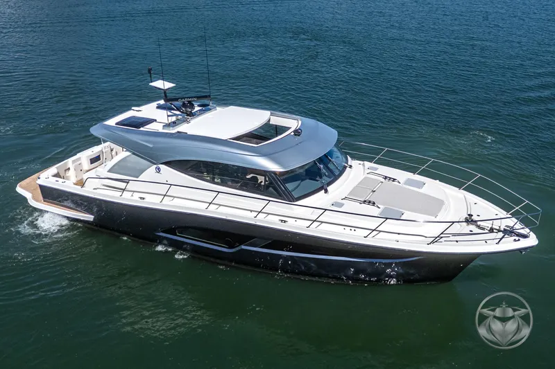 Slide: The Image of 2025 Riviera 465 SUV luxury yacht cruising on open water. - 15