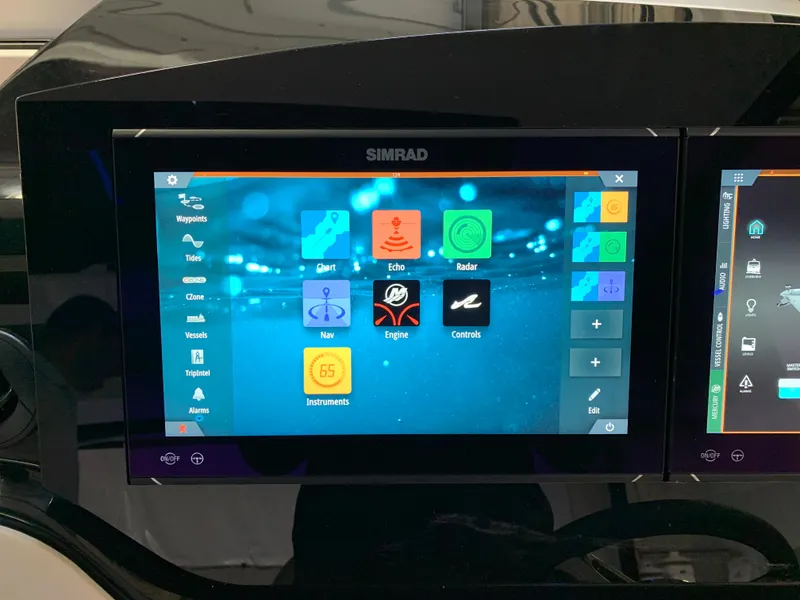Slide: The Image of Simrad navigation display on 2023 Sea Ray Sundancer 370 OB boat. - 20