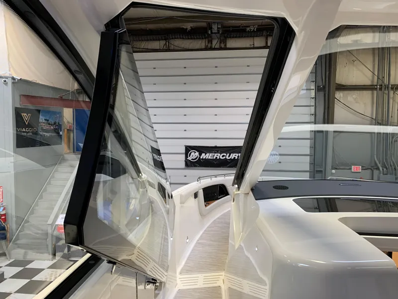 Slide: The Image of 2023 Sea Ray Sundancer 370 OB yacht interior with open window. - 27