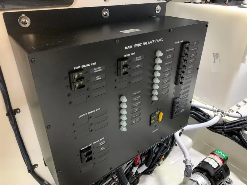 Slide: The Image of Main 12VDC breaker panel on a 2023 Sea Ray Sundancer 370 OB boat. - 48