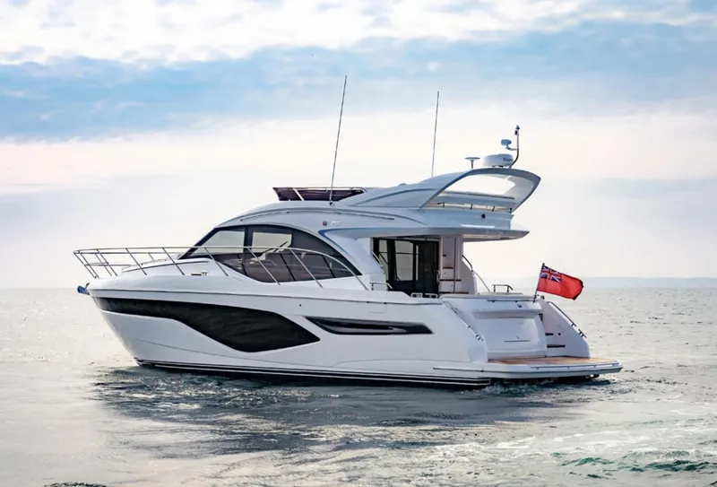 Slide: The Image of 2025 Princess F50 yacht cruising on open water. - 6