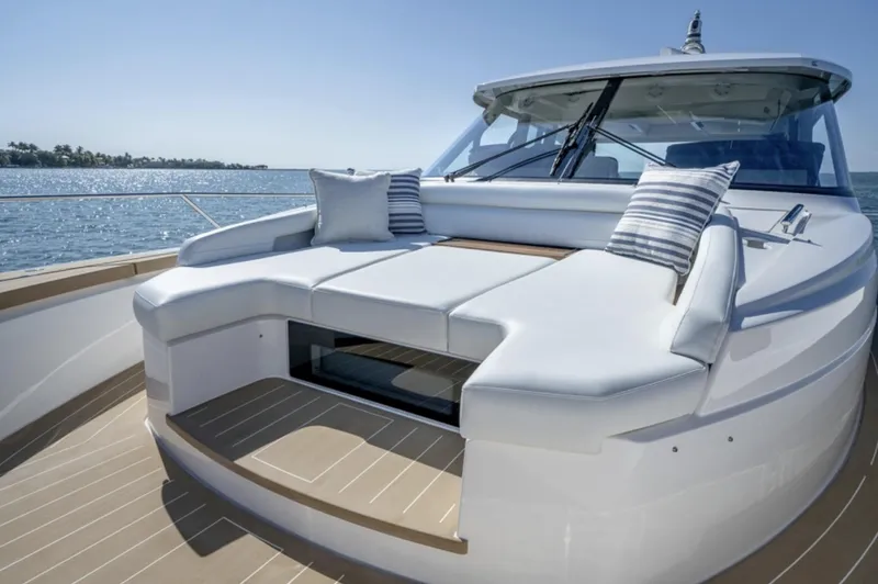 Slide: The Image of 2024 Tiara Yachts EX 60 luxury yacht with spacious deck seating. - 5