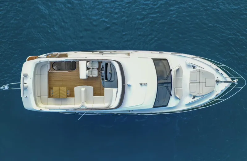 Slide: The Image of Top view of 2025 Princess F55 luxury yacht on blue water. - 10