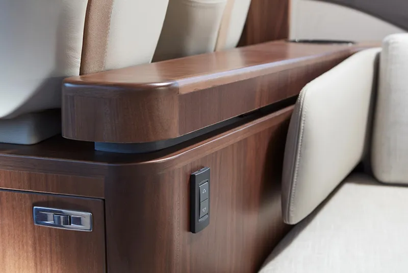 Slide: The Image of Luxurious interior of the 2025 Princess F55 yacht with wooden accents and beige seating. - 25