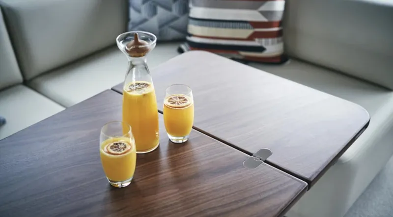 Slide: The Image of Orange juice on wooden table in Princess F55 yacht, 2025 model. - 28