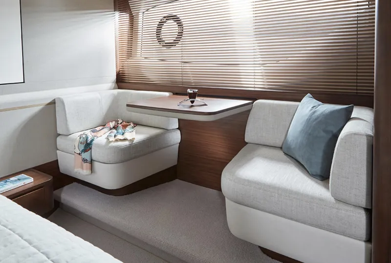 Slide: The Image of Luxurious interior of 2025 Princess F55 yacht with cozy seating and elegant decor. - 35