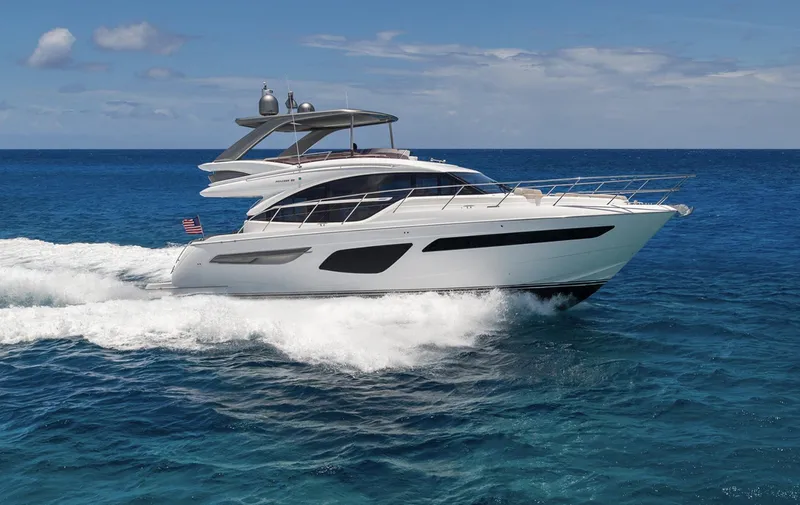 Slide: The Image of 2025 Princess F55 yacht cruising on open blue ocean. - 44