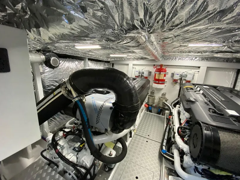 Slide: The Image of Engine room of 2025 Princess F55 yacht with advanced machinery and fire safety equipment. - 47