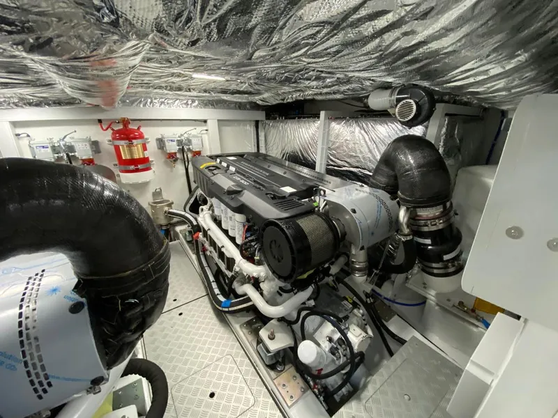 Slide: The Image of Engine room of 2025 Princess F55 yacht with advanced machinery and fire safety equipment. - 48
