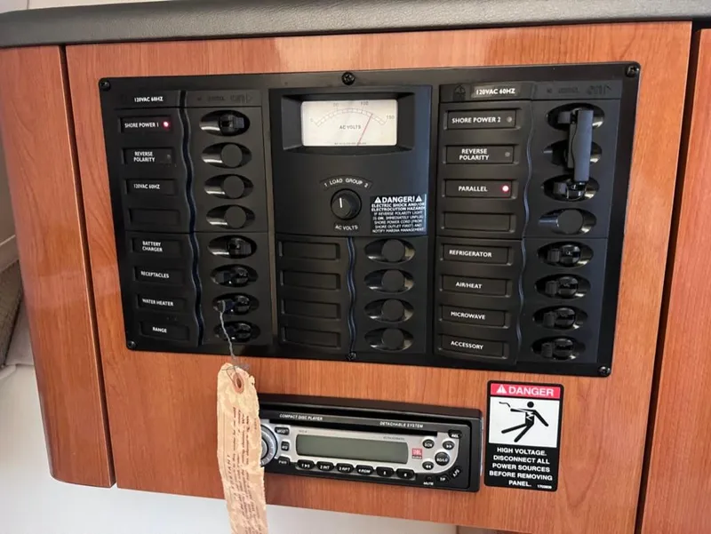 Slide: The Image of Maxum 2500 SCR 2005 electrical control panel with switches and voltage meter. - 14