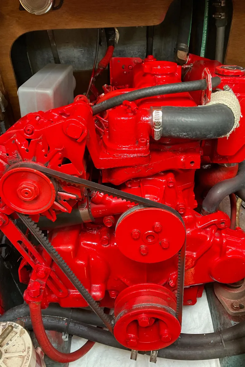 Slide: The Image of Bright red engine of a 1989 Sabre 34 MK II sailboat. - 15