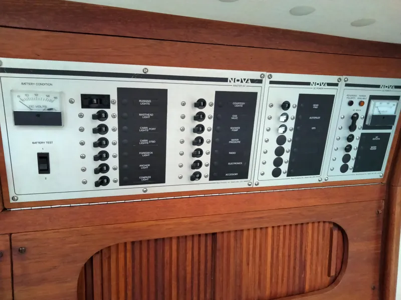 Slide: The Image of Control panel of a 1989 Sabre 34 MK II sailboat with various switches and gauges. - 20