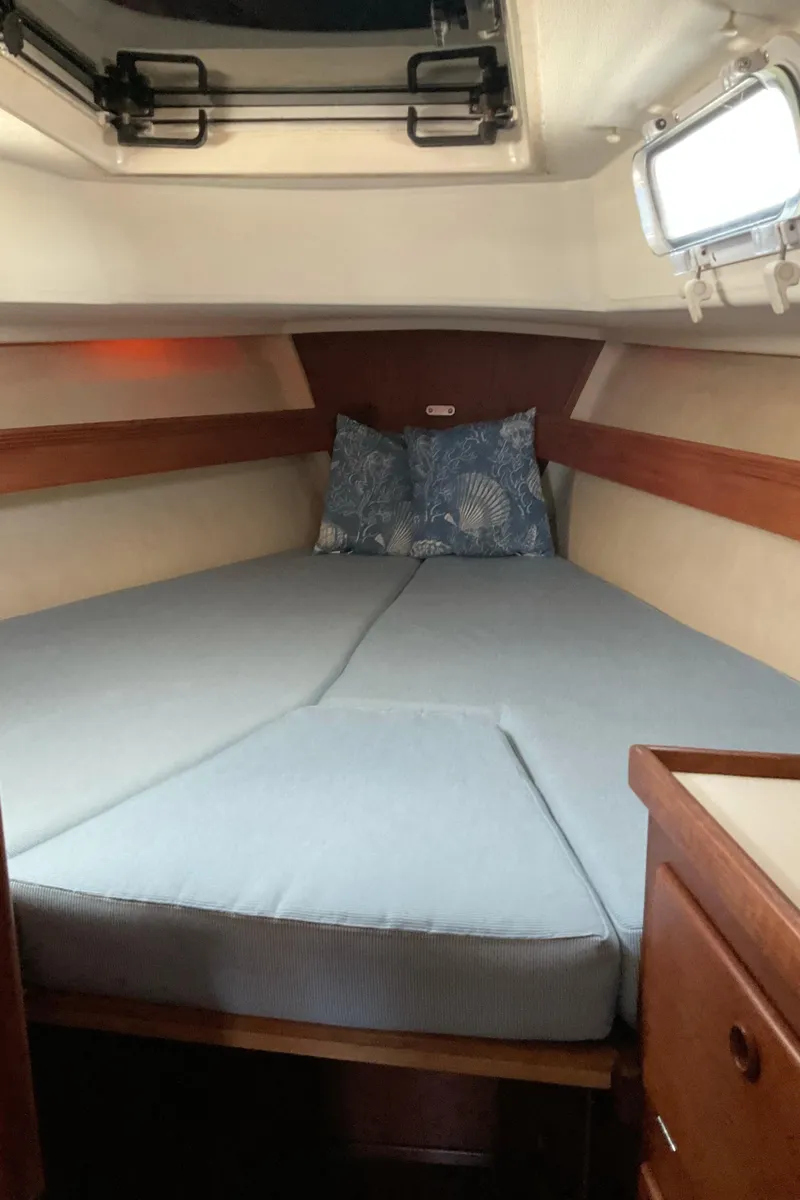 Slide: The Image of Interior cabin of a 1989 Sabre 34 MK II sailboat with a cozy V-berth. - 27