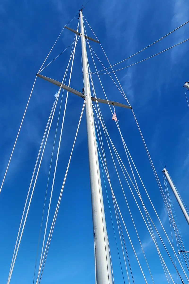 Slide: The Image of 1989 Granada 375 Atlantica sailboat mast against blue sky - 19