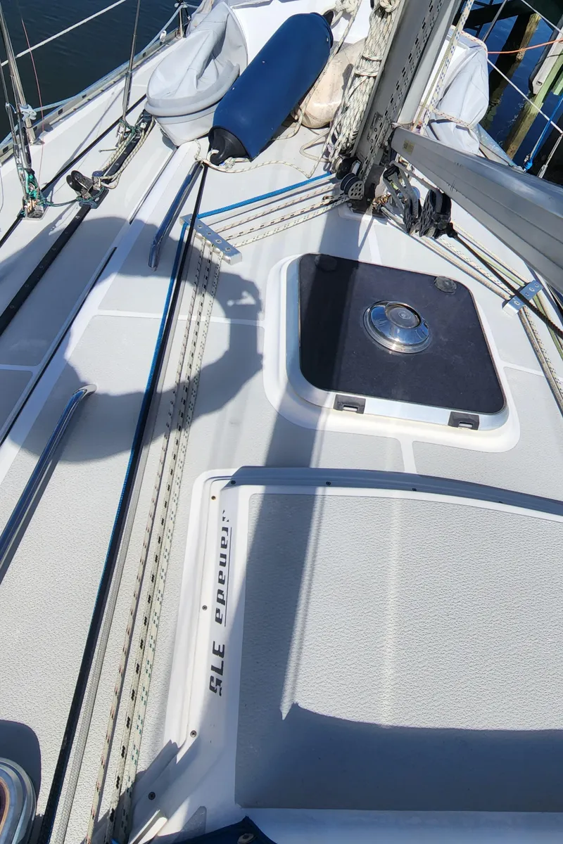 Slide: The Image of 1989 Granada 375 Atlantica sailboat deck with rigging and hatch. - 23