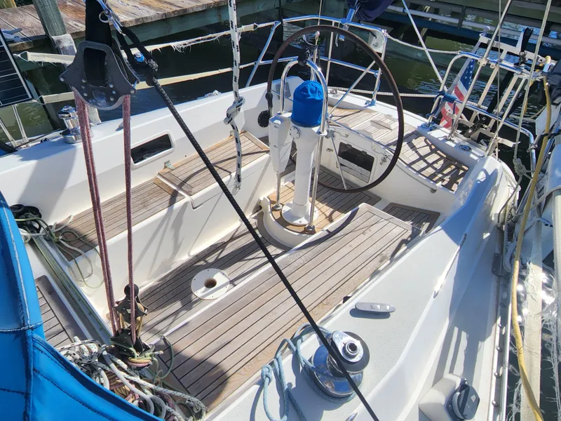 Slide: The Image of Cockpit of 1989 Granada 375 Atlantica sailboat with wooden deck and steering wheel. - 5