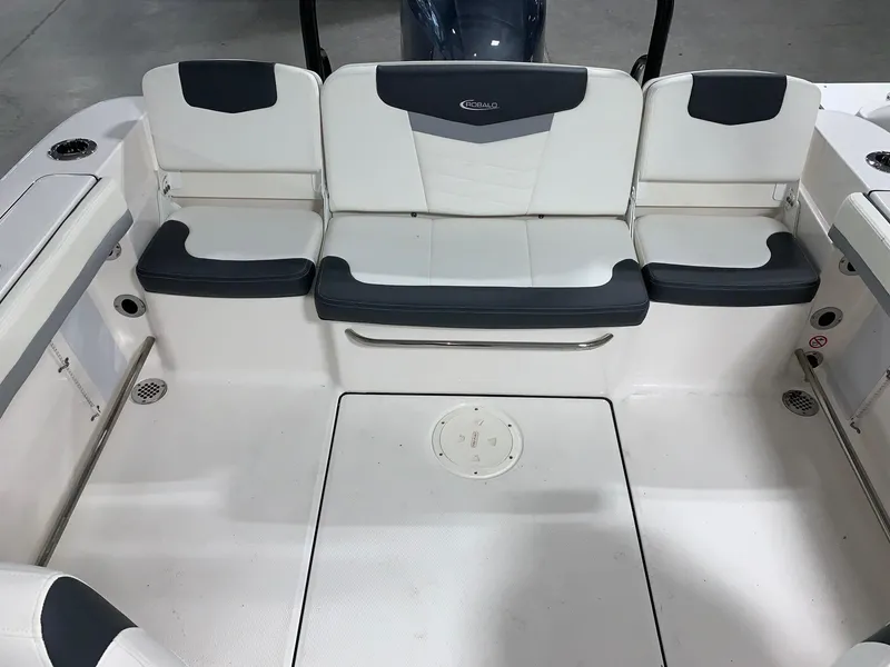 Slide: The Image of 2024 Robalo R207 Dual Console boat interior seating area. - 13