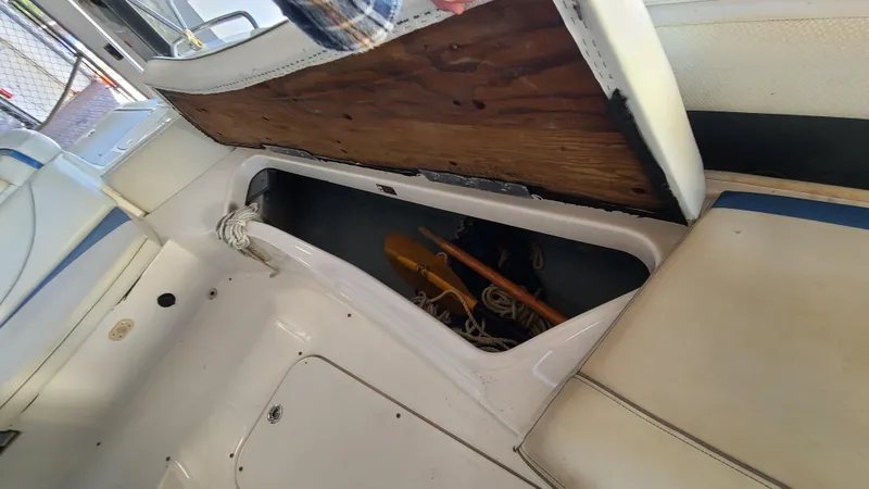 Slide: The Image of Open storage compartment in a 2006 Bayliner 197 SD boat. - 29
