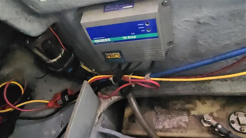 Slide: The Image of Bayliner 197 SD 2006 boat electrical system with Guest 10 Amp charger. - 33