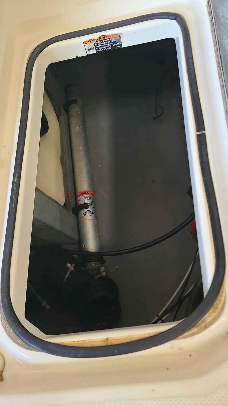 Slide: The Image of Storage compartment of a 2006 Bayliner 197 SD boat. - 35