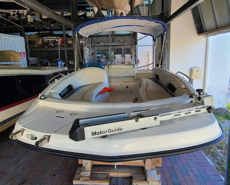 Slide: The Image of 2006 Bayliner 197 SD boat with MotorGuide trolling motor in storage. - 4