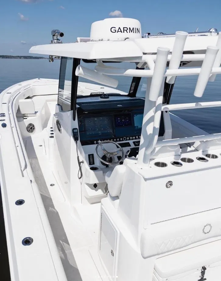 Slide: The Image of 2024 Fountain Bluewater 38 Tournament Edition boat with Garmin navigation system. - 13