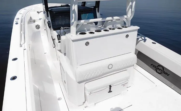 Slide: The Image of 2024 Fountain Bluewater 38 Tournament Edition boat interior with seating and console. - 17