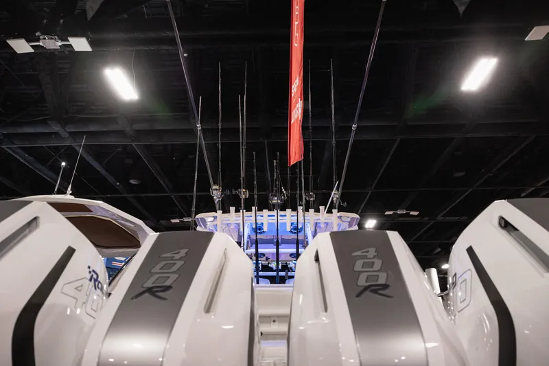 Slide: The Image of 2024 Fountain Bluewater 38 Tournament Edition boat with 400R engines at indoor boat show. - 23