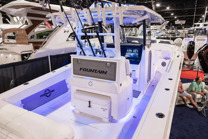 Slide: The Image of 2024 Fountain Bluewater 38 Tournament Edition boat at indoor boat show. - 24
