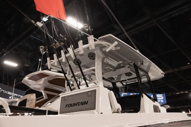 Slide: The Image of 2024 Fountain Bluewater 38 Tournament Edition boat with fishing rods and equipment. - 25