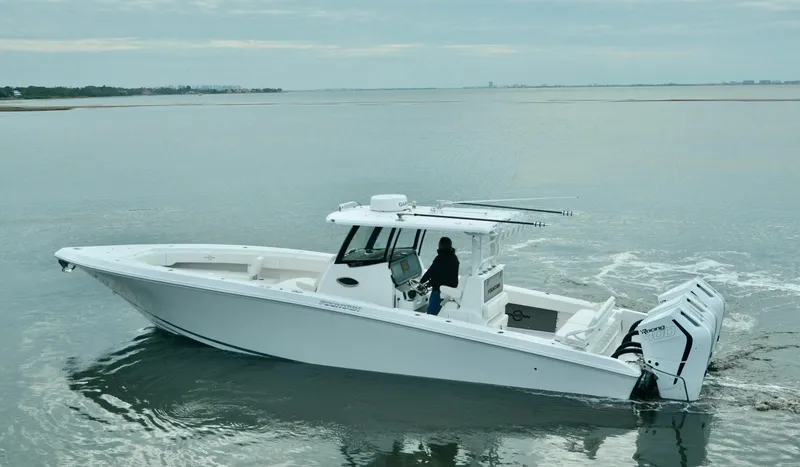 Slide: The Image of 2024 Fountain Bluewater 38 Tournament Edition boat on calm waters. - 3